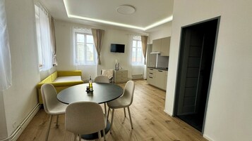 Deluxe Apartment, 1 Bedroom, City View | Minibar, blackout drapes, soundproofing, free WiFi