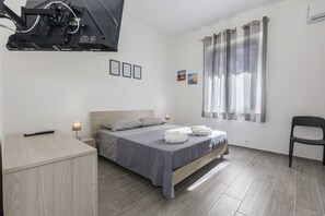 2 dormitorios, tabla de planchar con plancha, wifi gratis y ropa de cama
