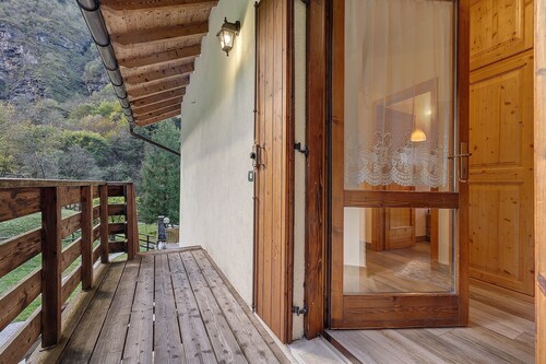 Apartment 'Con La Testa Fra Le Nuvole' with Mountain View, Shared Terrace and Wi-Fi