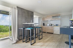 Fridge, coffee/tea maker, cookware/dishes/utensils, spices