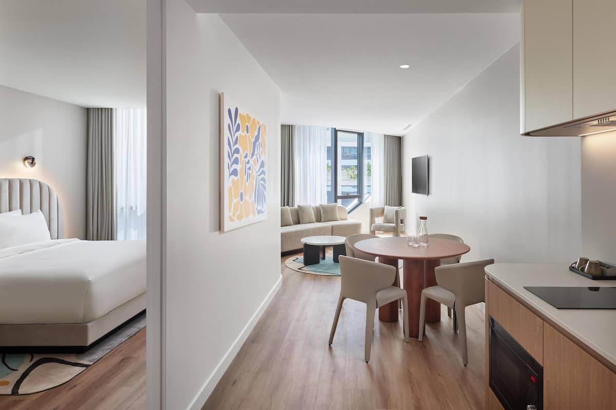 Suite, 1 King Bed | Premium bedding, in-room safe, blackout curtains, iron/ironing board