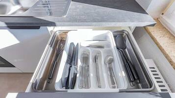 Fridge, stovetop, coffee/tea maker, cookware/dishes/utensils