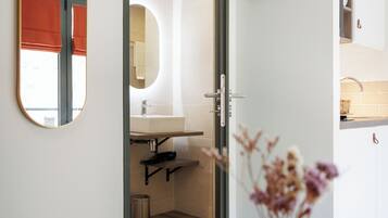 Family Twin Room | Living area | 80-cm flat-screen TV with digital channels