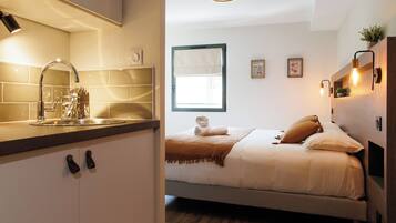 Standaard tweepersoonskamer | Luxe beddengoed, pillowtop-bedden, een minibar, verduisterende gordijnen