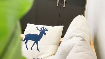 Deluxe Apartment, Balcony, City View | Living area | Flat-screen TV