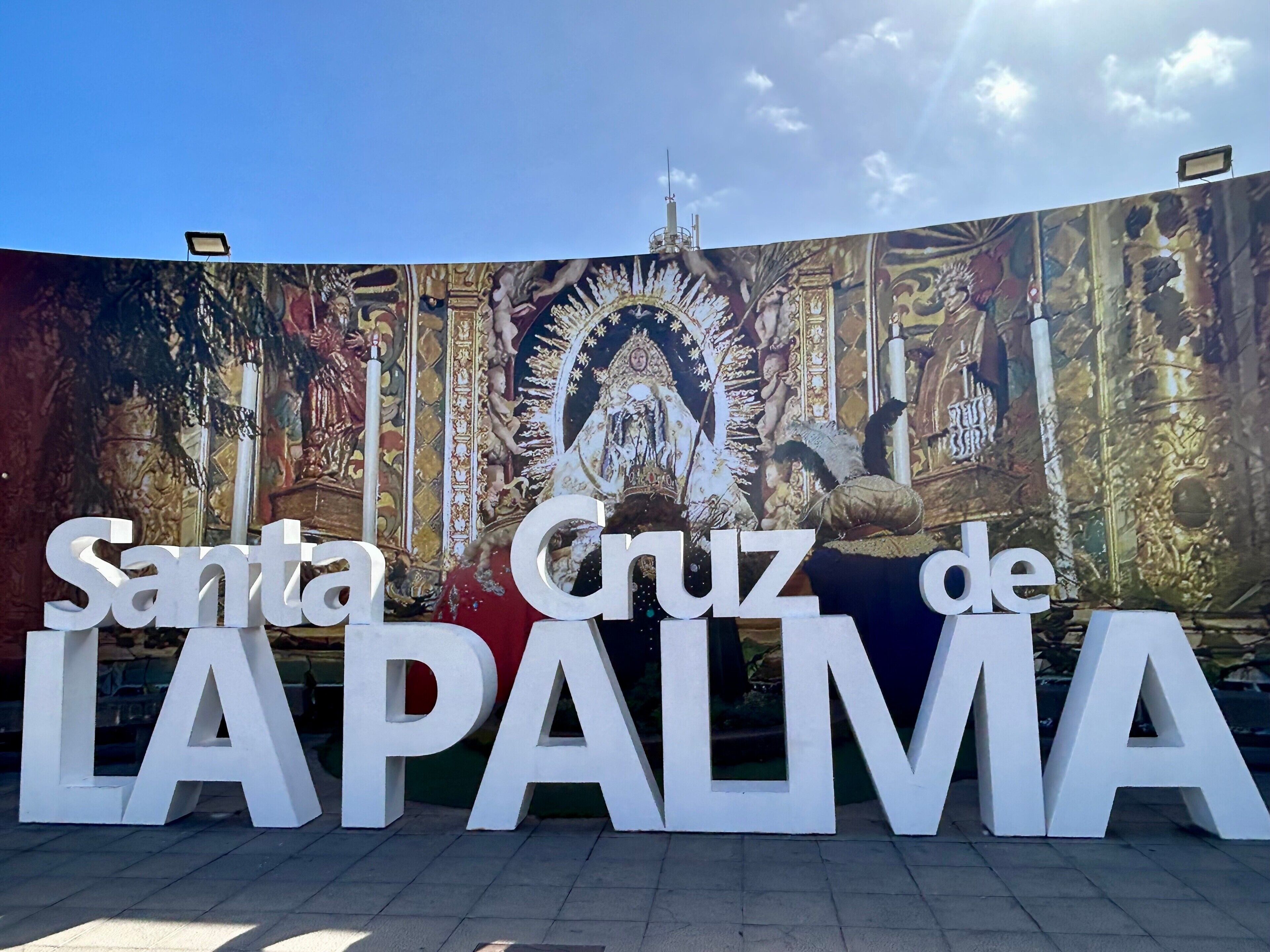 A large sign with 'Santa Cruz de la Palma' written in white letters.
