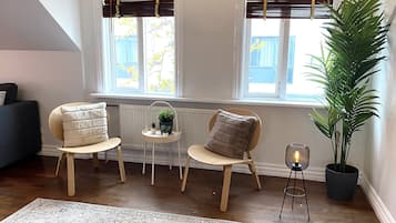 Comfort Apartment, 2 Bedrooms | Living area | 20-inch LCD TV with cable channels