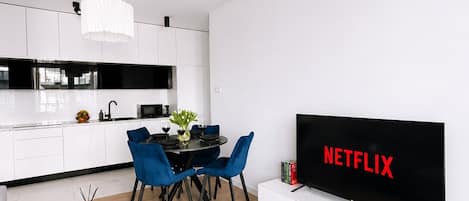 Classic Apartment, Courtyard View | Living area | 40-inch plasma TV with digital channels