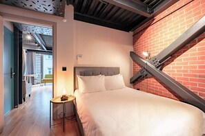 1 bedroom, desk, iron/ironing board, travel crib