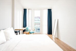 1 bedroom, desk, iron/ironing board, travel crib