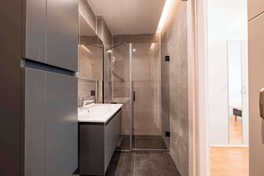 Dutxa, assecador de cabells i tovalloles 