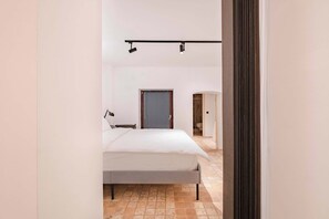 1 bedroom, desk, iron/ironing board, travel crib