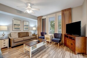 TV, fireplace - Market Street 2-Bedroom Retreat - Your Cozy Haven in the Village of Baytowne Wharf at Sandestin Golf and Beach Resort! (Miramar Beach)