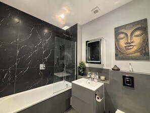 Shower, hair dryer, towels