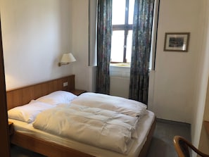 Desk, laptop workspace, free WiFi, bed sheets