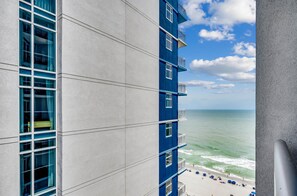 A high-rise building with a view of the beach and ocean. - 🏖️Stunning Ocean Views | Pools + Hot Tub | Bay View Resort 1603🏖️ (Myrtle Beach)
