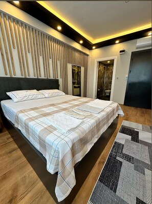 Kahden hengen standard-huone, 1 keskisuuri parisänky, tupakointi kielletty, oma kylpyhuone | Minibaari, työpöytä, ilmaiset vauvansängyt, ilmainen Wi-Fi