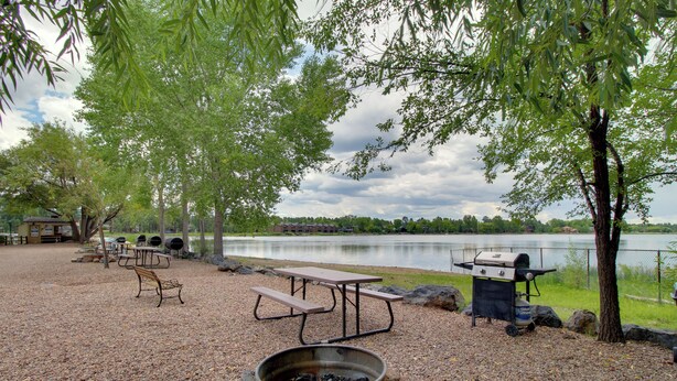 Unclassified image, 1 of 24, button - 1 Mi to Rainbow Lake: Wooded Retreat w/ Deck! (Lakeside)