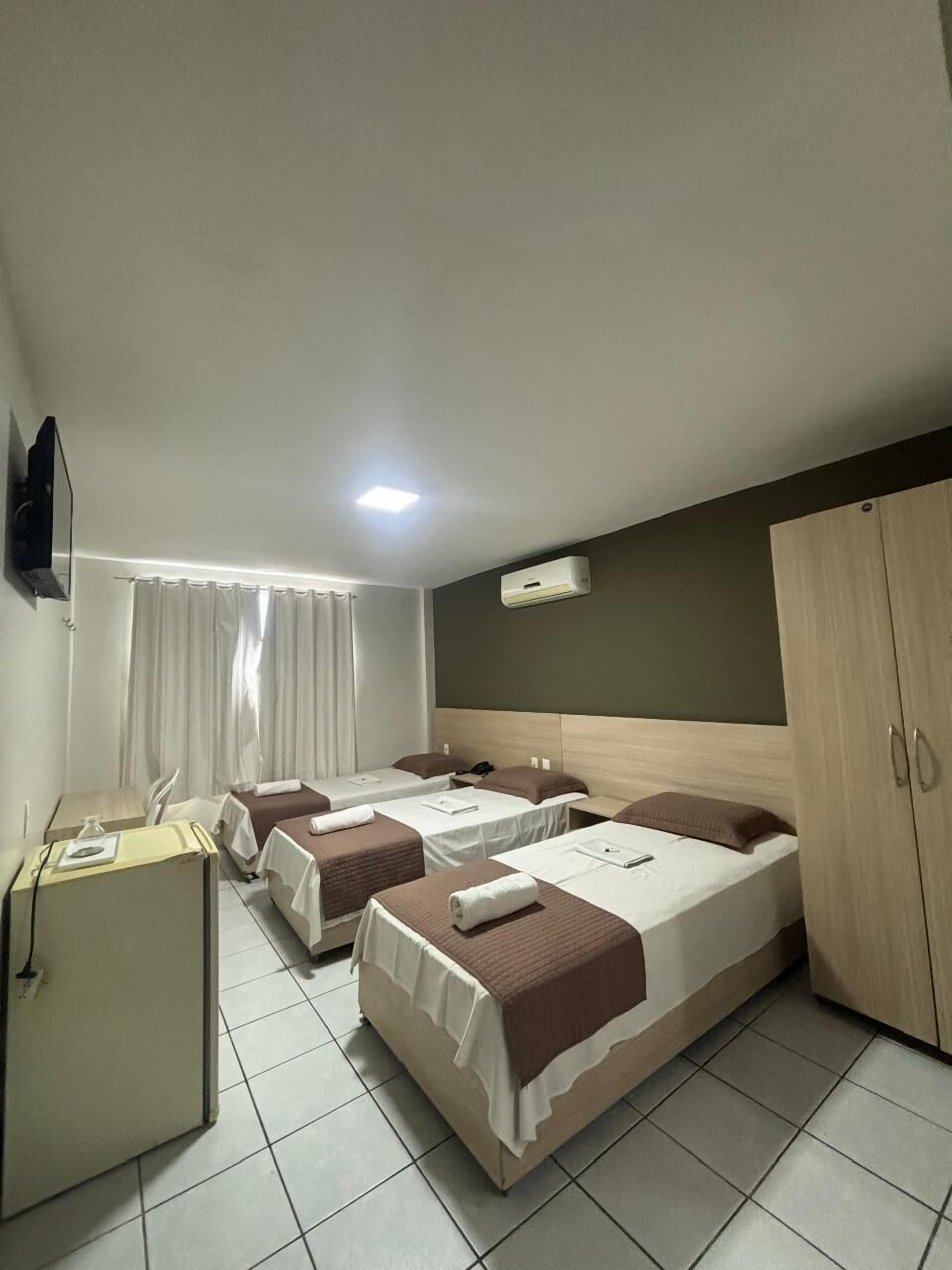 Basic Triple Room | Bathroom | Rainfall showerhead, towels, soap, toilet paper