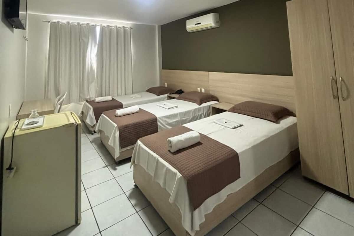 Basic Triple Room | Bathroom | Rainfall showerhead, towels, soap, toilet paper