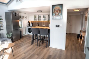Apartamento exclusivo | Área de estar | TV de tela plana, DVD player