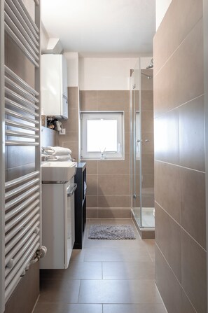 Apartamento exclusivo | Banheiro | Produtos de toalete grátis, secador de cabelo, toalhas de banho