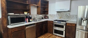 Charming 3-bedroom house with fitness equipment in an established neighborhood.