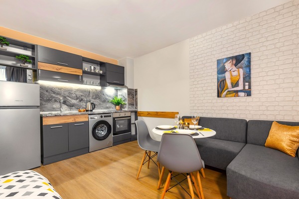Estudio estándar, balcón, vistas a la ciudad | Cortinas opacas y sistema de insonorización