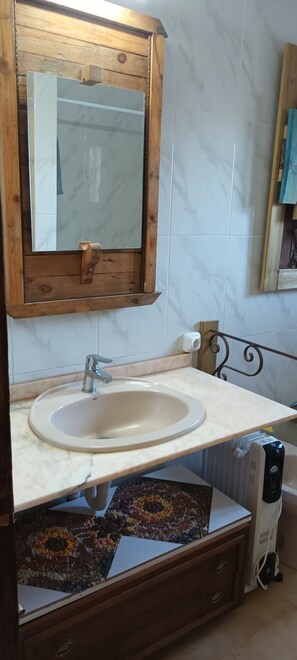 Hair dryer, bidet, towels, soap
