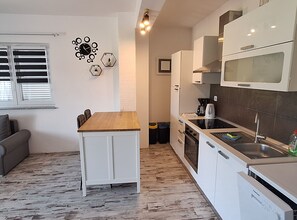Apartment (One Bedroom Apartment With Sea View) | Private kitchen | Fridge