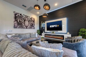 TV, fireplace, video games, offices - Experience Luxury in Your 11 En-Suites Mansion (Orlando)