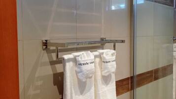Shower, hair dryer, towels, soap
