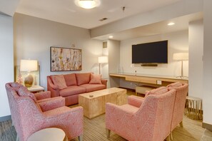 Smart TV, fireplace, books, offices