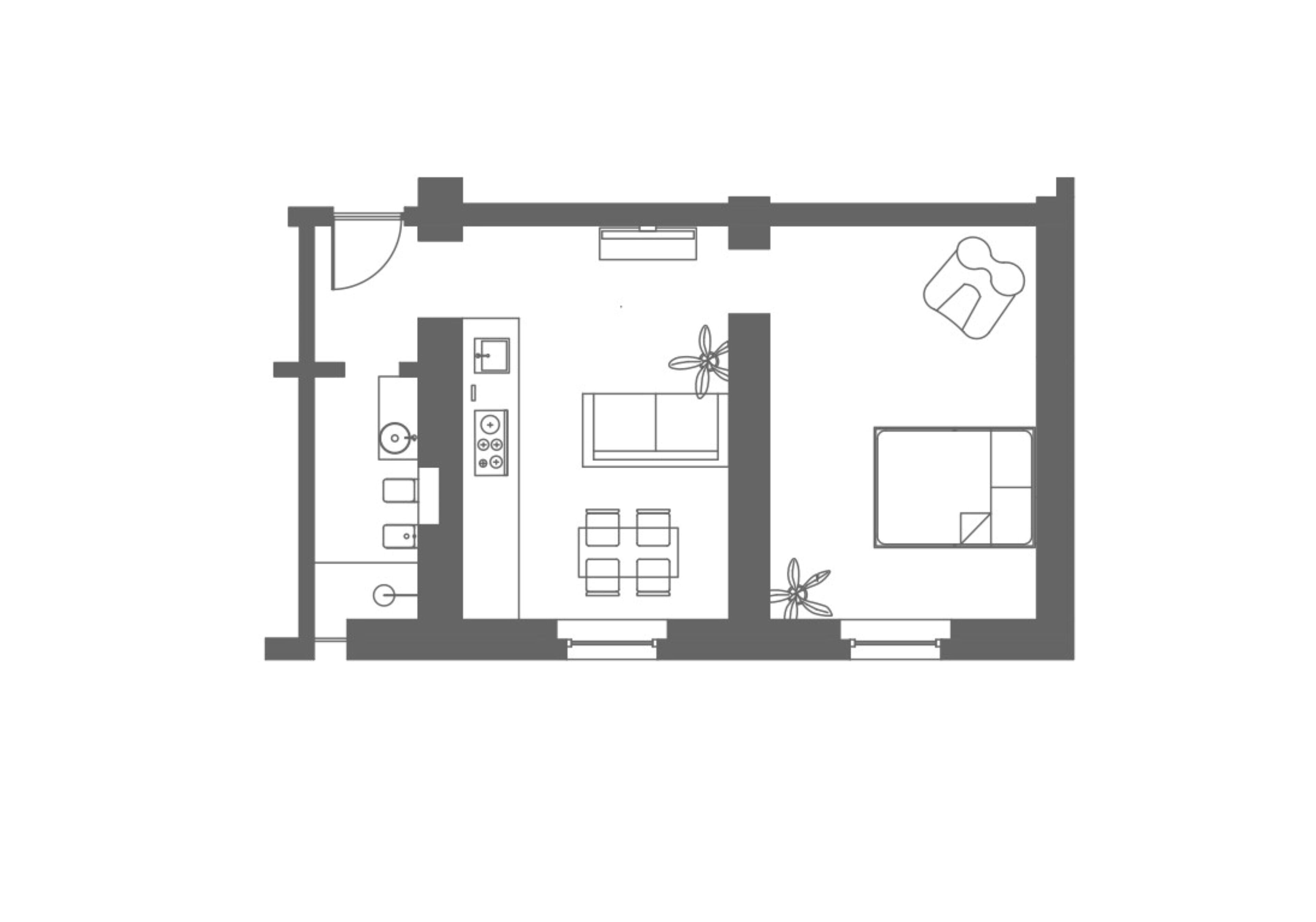 A floor plan of a hotel room with a kitchenette, a dining area, a bathroom, and a small balcony.