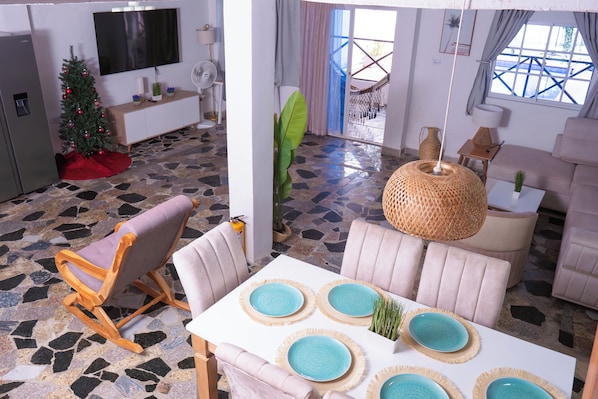 Dining area and open floor plan living room