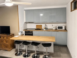 Fridge, microwave, oven, stovetop - 2-bed Apartment in Arona, Sleeps 5 w/ Outdoor Pool (Arona)