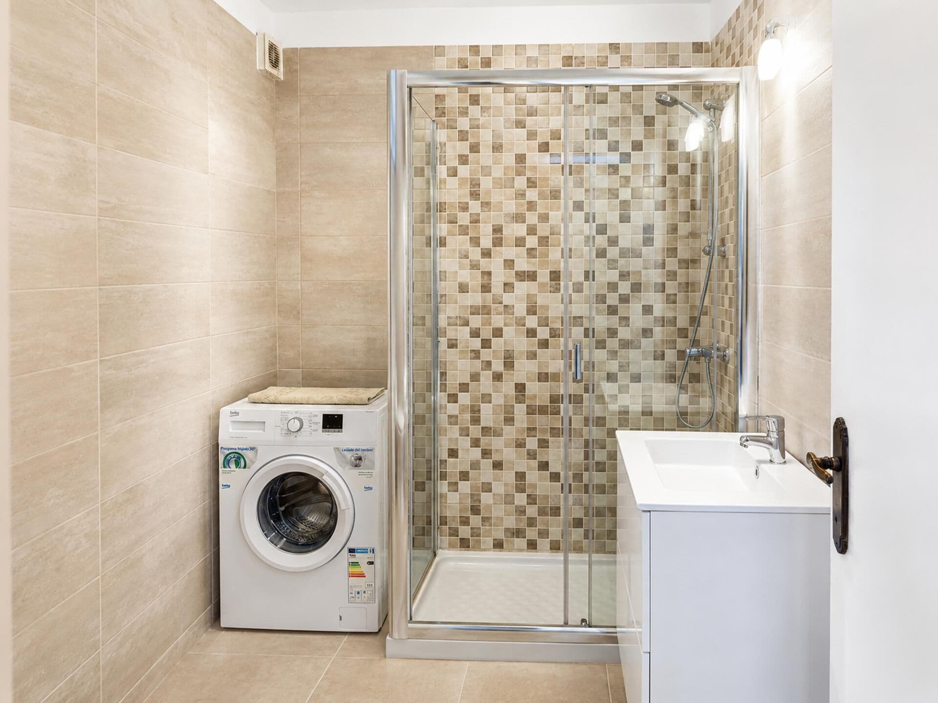 Shower, towels, toilet paper