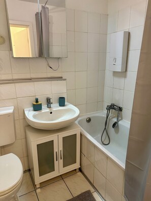 Hair dryer, towels, toilet paper