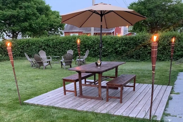 Large backyard with grill, dining table & chairs
Cozy fire pit with 6 chairs