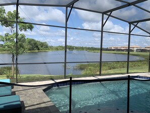 Outdoor pool, a heated pool - 4 bed lakeside villa with private  pool set in exclusive gated community  (Haines City)