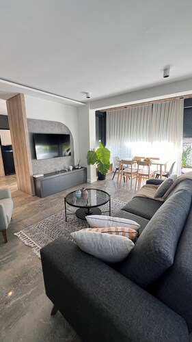 Charming Beachside Apartment with Private Garden