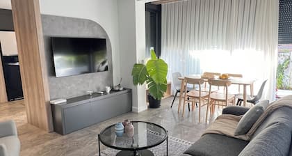 Charming Beachside Apartment with Private Garden