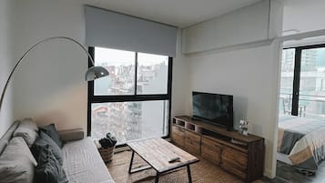Apartamento | Área de estar | TV