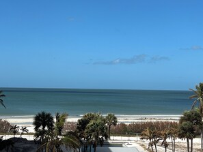 On the beach, sun loungers, beach towels - Breathtaking Beachfront Luxury  2BR Gulf-Front Oasis with Panoramic Views (Fort Myers Beach)