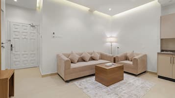 Family Apartment, 2 Bedrooms, Partial Ocean View | Living area