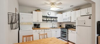 NEW LISTING! Cozy 2BR Condo - Beachside Bliss with Yard Space