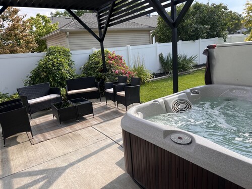 NEW LISTING! Cozy Corner Oasis with Hot Tub