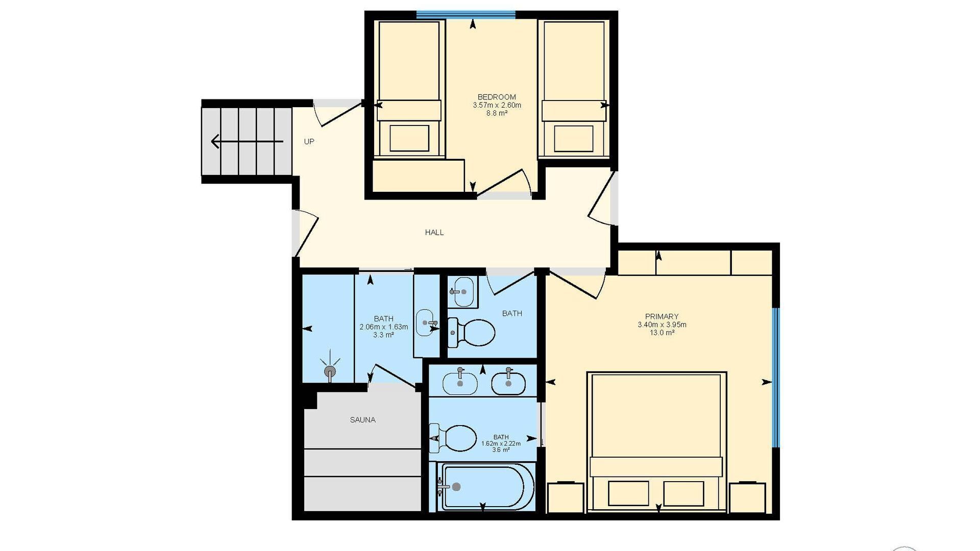 Plano de planta que muestra un dormitorio, dos baños, una habitación principal, un pasillo y una sauna.