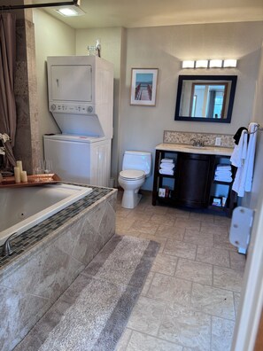 Jetted bath, hair dryer, towels, soap