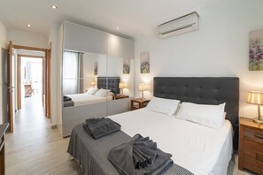 4 makuuhuonetta, tallelokero huoneessa, silitysrauta/-lauta